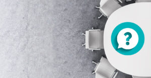 conference table with question mark on it