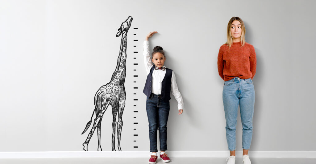 kid measuring themselves and adult looking confused